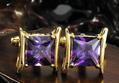 Gilded cufflinks with purple crystal